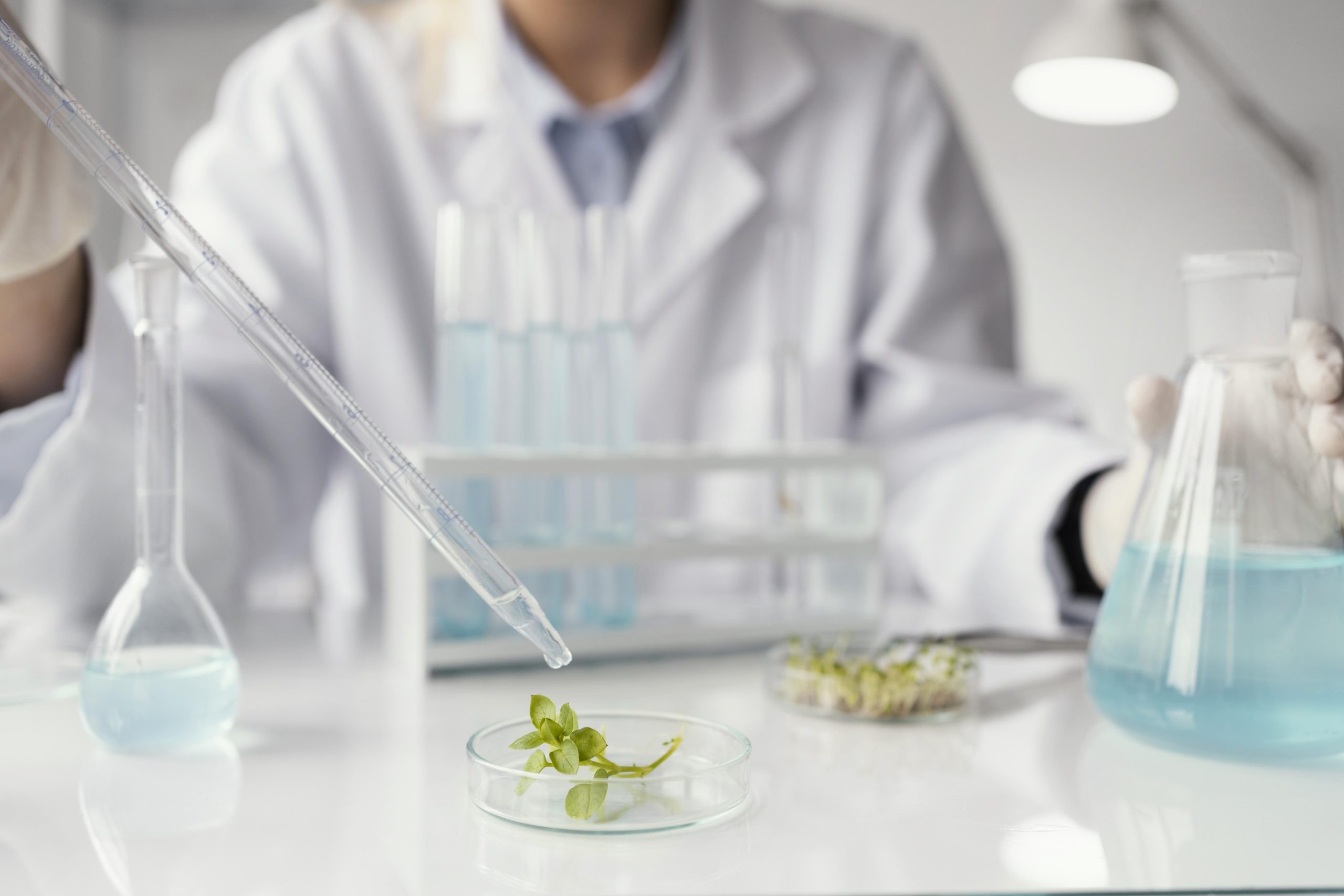 close up researcher with pipette